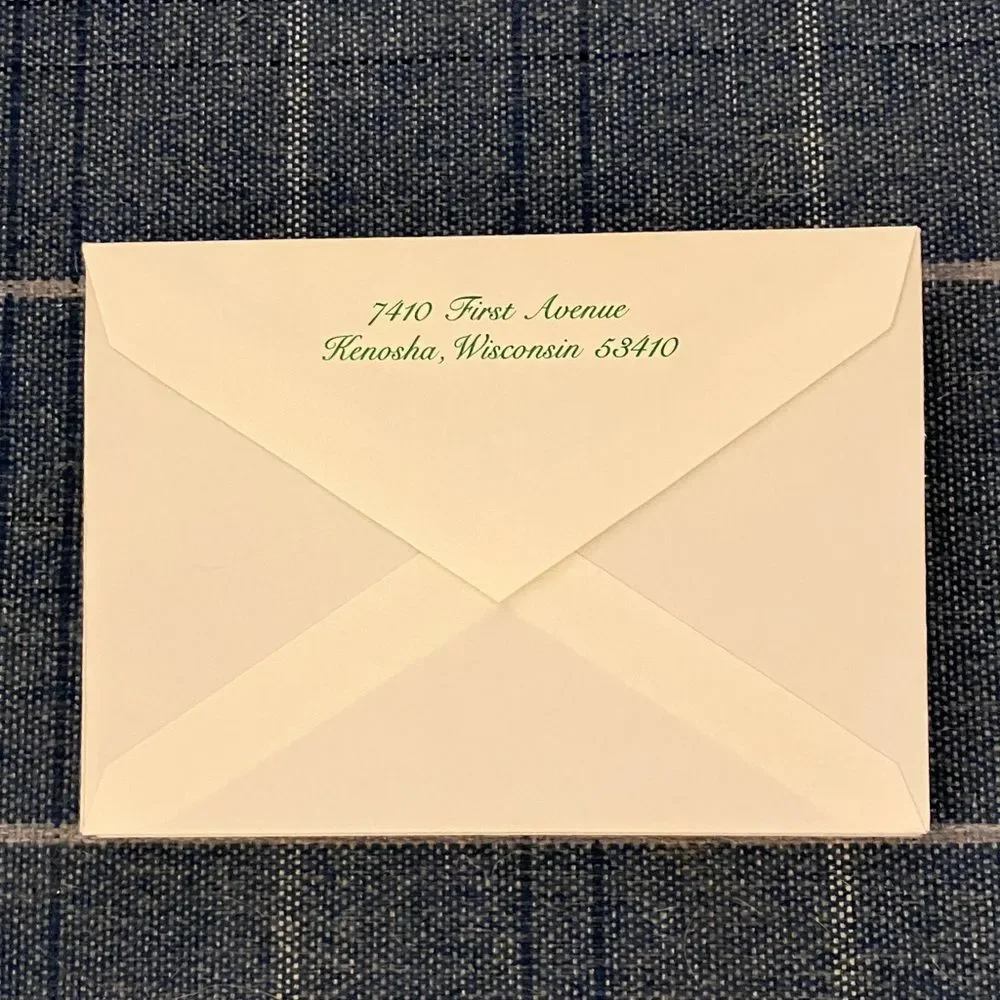 9 White and Green Envelopes